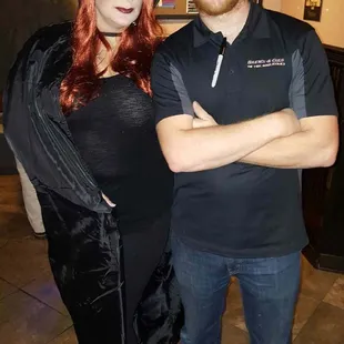 a man and a woman dressed in costumes