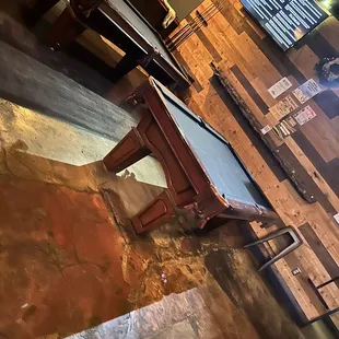 a pool table in a bar