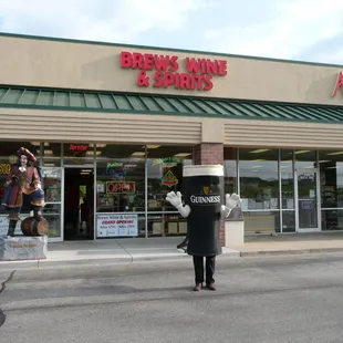 a person in a costume standing in front of a store