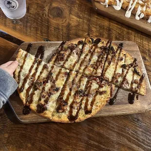 Sun-dried tomato flatbread on cauliflower crust.