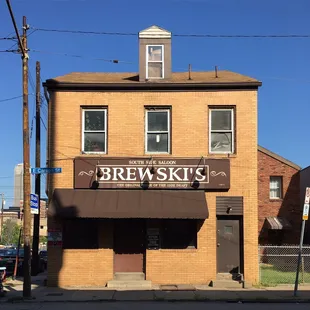 the front of a brick building
