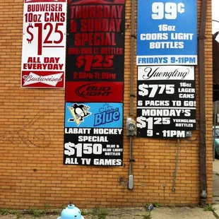 a fire hydrant in front of a brick building