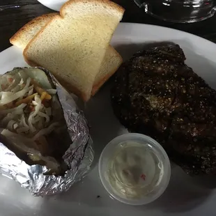 Thursday $10 ribeye. Salad, steak, baked potato, bread, all for $10! I think it was like $1 more for cheese and sour cream.