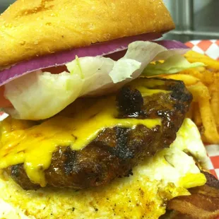 Double bacon cheeseburger with a fried egg.