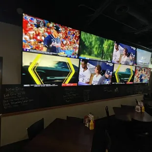 a wall of televisions