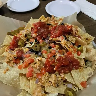 Chicken nachos no queso add salsa.