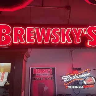 a neon sign in a bar