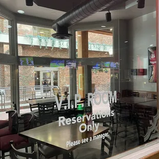 a view of a restaurant through the window