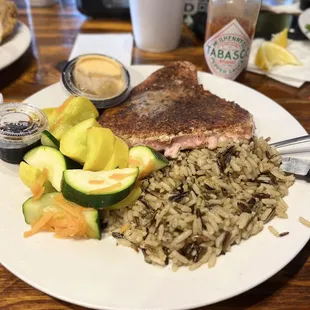 Blackened Salmon with dirty rice and fresh vegetables