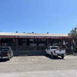 trucks parked in front of the building