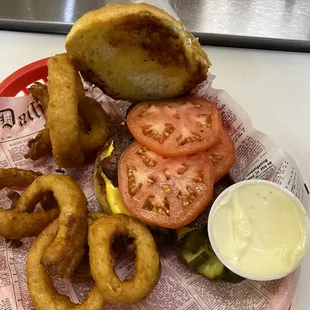 a burger and onion rings
