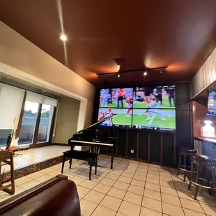 Stage live music area and large screen tv for sports