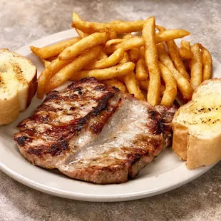 8oz pork chop butterflied served with fries