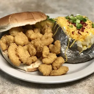 Fried shrimp sandwich with loaded baked potato