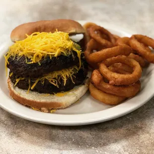 Double patty Brewster burger with onion rings