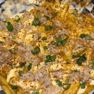 a cheesy pizza in a basket