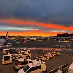 an airport at sunset