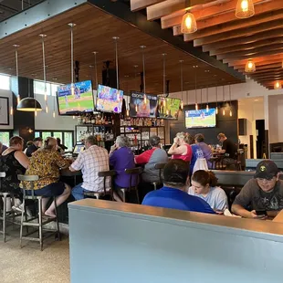 people sitting at the bar