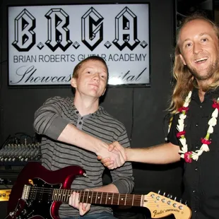 Brian with one of his students after his performance.