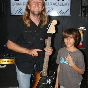 Brian with one of his youngest student after his performance.
