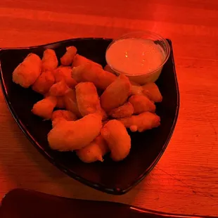 Cheese curds appetizer - from a pre-cooked bag, not hand tossed.
