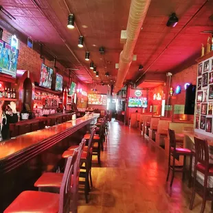 a woman behind the bar