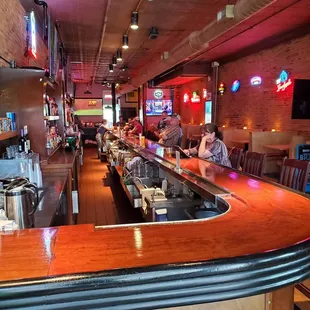 people sitting at the bar