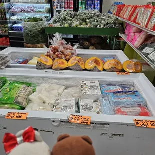 Frozen food, fresh produce, cold beverages, and refrigerated items