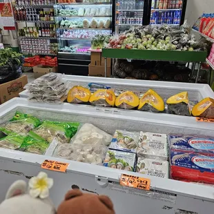 Besides fresh veggies, this vendor also has cold beverages, cooking ingredients, and frozen items