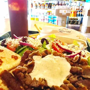 Gyros platter. Thought it came with hummus but I&apos;m. It seeing any..