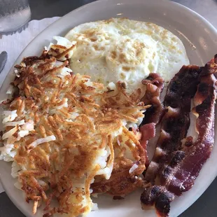 2 eggs any stile (over medium) bacon and hash browns