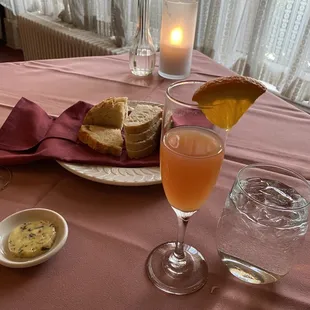 Bread, wildflower butter and berry mimosa