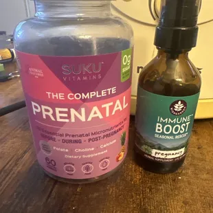 a bottle of the complete prenatal and a bottle of the complete prenatal