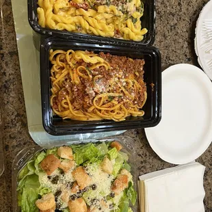 a variety of food in plastic containers