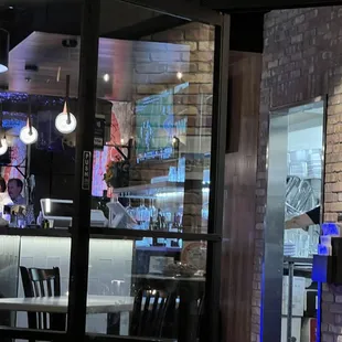 a view of a restaurant through a window