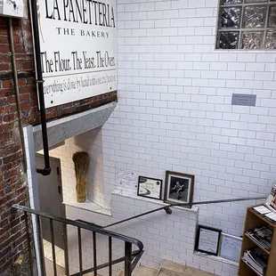 a staircase leading to a kitchen