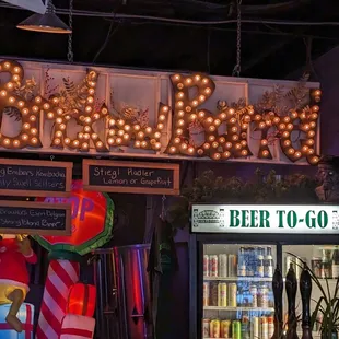 a neon sign for a beer shop