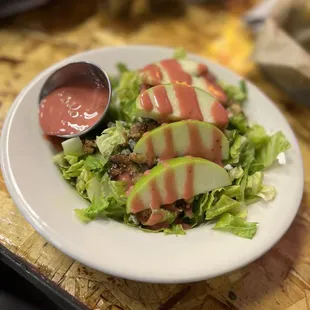 Basic salad with romaine and raspberry dressing  .. So so good !!