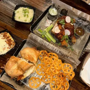 Hot chicken, chimichurri chicken sandwich, poblano mash potatoes, habanero bacon mac