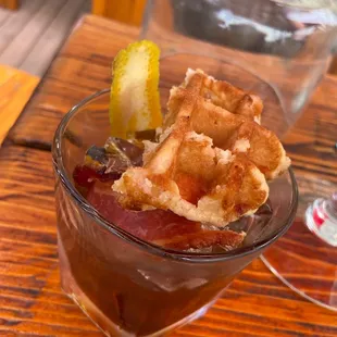 Smoked Maple Old Fashioned with waffle and Bacon