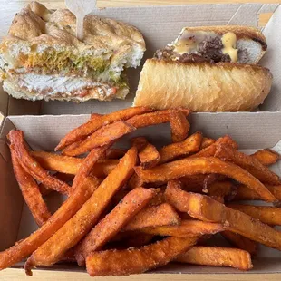 chicken parm (left) and Philly cheesesteak (right) plus sweet potato fries