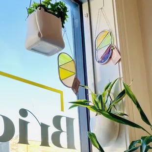 The hanging plant holder and the stain glass pieces!