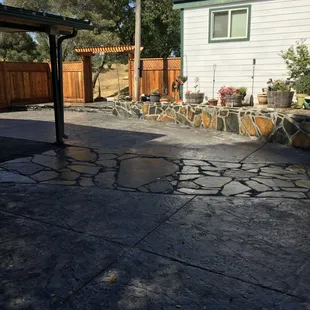 Stamped concrete with flagstone paver walkway