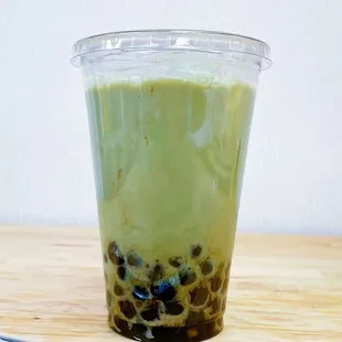 a cup of matcha bubble tea