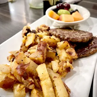 Home fries , 2 sausage Patties &amp; fruit (substituted instead of eggs) comes with Belgium waffle combo