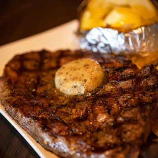 steak and potatoes on a plate