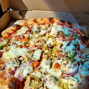 Large "supreme" replaced sausage with tomatoes. 16" $19