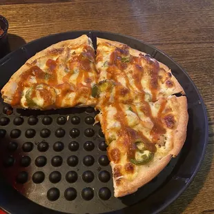 a pizza on a pizza pan