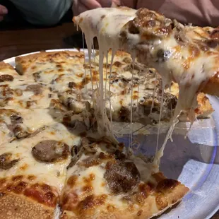 Fantastic build your own pizza. Sausage and mushroom.