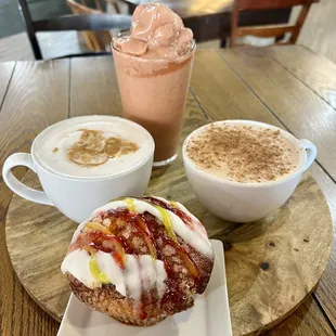 a cup of coffee and a pastry